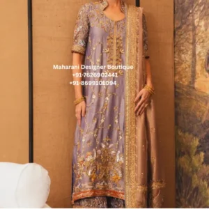 Lavender Embroidered Salwar Suit with Gold Handwork Dupatta | Festive & Wedding Wear Add timeless elegance to your ethnic wardrobe with our Lavender Gold Embroidered Salwar Suit, a graceful outfit created for festive celebrations, wedding functions and special occasions. The soft lavender tone is beautifully complemented by intricate gold-toned embroidery, creating a sophisticated and luxurious appearance. The straight-cut kurta features detailed floral and ornamental embroidery throughout the front, with delicate embellishment extending toward the neckline and sleeves. The richly embroidered lower border adds definition to the silhouette, while the coordinated bottom features elegant detailing for a polished traditional look. The highlight of this outfit is the beautiful contrasting dupatta, finished with an ornate golden border and delicate embroidered motifs. Draped over the shoulder or styled traditionally, the dupatta adds an elevated festive touch to the complete ensemble. This embroidered salwar suit for women is an excellent choice for wedding guests, festive gatherings, family celebrations, traditional ceremonies, engagement functions, receptions and evening occasions. Its elegant lavender and gold combination makes it easy to accessorize with statement earrings, bangles, jhumkas or a delicate necklace. Key Highlights Elegant lavender ethnic outfit Intricate floral and traditional embroidery Beautiful gold-toned embellishment Detailed neckline and sleeve work Richly decorated kurta border Coordinated embellished bottom Statement dupatta with ornate golden border Graceful choice for festive and wedding occasions Suitable for wedding guests and family celebrations Elegant Indian ethnic wear for women Perfect for styling with traditional jewellery Styling Inspiration Pair this lavender salwar suit with gold jhumkas, embellished heels and a traditional clutch for a sophisticated wedding guest look. For daytime celebrations, keep the jewellery minimal and let the embroidery stand out. For an evening event, add layered bangles, statement earrings and a soft glam makeup look. The soft lavender colour also makes this outfit ideal for festive wear, wedding wear, engagement ceremonies, family functions and traditional celebrations. The gold detailing brings warmth to the pastel shade and gives the ensemble a refined festive appearance. Perfect For Wedding guest outfits Indian wedding wear Festive salwar suits Engagement outfits Reception wear Family functions Traditional ceremonies Festive parties Diwali outfits Eid celebrations Mehndi functions Sangeet celebrations Special evening occasions lavender salwar suit, lavender embroidered suit, lavender gold salwar suit, embroidered salwar suits for women, wedding wear salwar suit, festive salwar suit, designer salwar suit, ethnic wear for women, Indian wedding outfits, wedding guest salwar suit, embroidered Punjabi suit, party wear salwar suit, traditional Indian suit, gold embroidery suit, lavender ethnic wear, salwar kameez online, Indian suits online, boutique salwar suits, wedding outfits for women, festive outfits for women, embroidered suit online, Punjabi suits online, luxury ethnic wear, Indian traditional wear, salwar suit for wedding, lavender suit for wedding