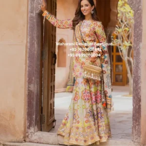 Royal Luxury Floral Heritage Embroidered Sharara Suit Set Bring colour and elegance to your ethnic wardrobe with the Royal Floral Heritage Embroidered Sharara Suit Set, a luxurious boutique outfit designed for women who appreciate premium craftsmanship and timeless style. Moreover, this stunning ensemble showcases vibrant floral embroidery inspired by traditional artistry, making it a beautiful choice for weddings, festive celebrations, engagement ceremonies, receptions, and cultural events. The beautifully embroidered kurta pairs effortlessly with a flowing sharara and a matching embellished dupatta to create a graceful and sophisticated silhouette. Furthermore, the intricate threadwork, colourful floral motifs, and elegant borders reflect the richness of handcrafted Indian fashion. As a result, this designer outfit offers a luxurious look that is perfect for both daytime and evening celebrations. Whether you're attending a wedding in London, celebrating Vaisakhi in Toronto, or dressing for a family event in New York, this premium sharara suit ensures you stand out with confidence and elegance. Premium Floral Embroidery The highlight of this outfit is its exquisite handcrafted floral embroidery. Additionally, skilled artisans carefully create colourful floral patterns across the neckline, sleeves, front panel, sharara, and dupatta, resulting in a rich and luxurious appearance. In addition, every embroidery detail is thoughtfully placed to create a balanced design that celebrates traditional craftsmanship while embracing modern elegance. Therefore, every piece reflects boutique-quality finishing and timeless beauty. Elegant Designer Kurta The straight-cut kurta offers a flattering silhouette suitable for every body type. Features Elegant round neckline Heavy floral embroidery Premium boutique stitching Comfortable straight fit Full sleeves Lightweight luxury fabric Fine handcrafted finishing Furthermore, the vibrant colours make this outfit ideal for weddings, festive celebrations, and destination events. Designer Sharara The flowing sharara adds movement, elegance, and traditional charm. Features Wide flared silhouette Comfortable waistband Premium-quality fabric Beautiful floral embroidery Lightweight construction Graceful movement Consequently, you can enjoy every celebration comfortably while maintaining a sophisticated appearance. Matching Embroidered Dupatta The embroidered dupatta completes the ensemble beautifully. Moreover, its decorative borders and colourful floral motifs perfectly complement the kurta and sharara. Likewise, the lightweight fabric drapes effortlessly, adding elegance to every step. Perfect for Every Occasion This luxury designer sharara suit is perfect for: Wedding Ceremony Reception Party Mehndi Function Sangeet Night Engagement Ceremony Haldi Celebration Eid Festival Diwali Celebration Karwa Chauth Raksha Bandhan Vaisakhi Festival Family Functions Cultural Events Destination Weddings Festive Gatherings Luxury Evening Parties Finally, its timeless elegance makes it an essential addition to every luxury ethnic wardrobe. Style It Beautifully Complete your look with: Kundan jewellery Statement jhumkas Gold bangles Embroidered potli bag Punjabi juttis or heels Soft glam makeup Loose curls or a classic bun Similarly, minimal accessories allow the colourful embroidery to remain the centre of attention. Why You'll Love This Outfit Vibrant floral embroidery Premium boutique craftsmanship Elegant designer sharara Comfortable all-day wear Lightweight luxurious fabric Perfect for weddings and festive occasions Timeless ethnic elegance Worldwide shipping available Perfect for Customers in the UK, USA & Canada Designed for women who love premium Indian fashion, this floral embroidered sharara suit is an excellent choice for customers searching for designer sharara suits in the UK, luxury ethnic wear in the USA, and boutique festive outfits in Canada. Moreover, its colourful design makes it ideal for multicultural weddings, destination celebrations, and festive events worldwide. Care Instructions Dry clean only Steam iron on low heat Store in a garment bag Protect embroidered areas during storage Avoid bleach and harsh detergents Why Choose Maharani Designer Boutique? At Maharani Designer Boutique, we specialize in luxury ethnic wear that blends traditional craftsmanship with contemporary elegance. Moreover, every outfit is crafted using premium fabrics, intricate embroidery, and expert tailoring to deliver boutique-quality fashion. We proudly serve customers across the UK, USA, Canada, Australia, and Europe, offering elegant outfits for weddings, festive occasions, and special celebrations. Floral Embroidered Sharara Suit, Designer Sharara Suit, Wedding Sharara Outfit, Luxury Sharara Set, Boutique Sharara Suit, Party Wear Sharara, Women's Ethnic Wear, Indian Boutique UK, Indian Boutique USA, Indian Boutique Canada, Festive Sharara Suit, Embroidered Dupatta Set, Luxury Wedding Outfit, Designer Ethnic Clothing, Maharani Designer Boutique.