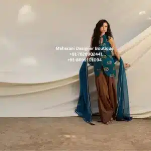Royal Teal Hand Embroidered Kurta Palazzo Set – Luxury Punjabi Suit with Brown Palazzo Refresh your ethnic wardrobe with our Luxury Punjabi Suit with Brown Palazzo a beautiful boutique ensemble designed for women who appreciate timeless elegance and exceptional craftsmanship. Moreover, this premium outfit combines traditional embroidery with a contemporary silhouette, making it the perfect choice for weddings, festive celebrations, engagement ceremonies, family gatherings, and cultural events. The luxurious teal blue kurta paired with a flowing brown palazzo and matching dupatta creates a sophisticated colour combination that stands out effortlessly. Furthermore, the handcrafted embroidery adds artistic detail that reflects authentic Indian craftsmanship while maintaining a modern boutique aesthetic. Whether you're attending a wedding in London, celebrating Diwali in Toronto, or dressing for a special event in New York, this designer Punjabi suit offers elegance, comfort, and versatility. Elegant Hand Embroidery Beautiful handcrafted embroidery enhances the neckline and front panel of the kurta. Additionally, every embroidered motif is carefully finished to provide a premium boutique appearance. The detailed craftsmanship reflects traditional artistry while creating a luxurious modern finish. Premium Designer Kurta The straight-cut kurta offers an elegant silhouette suitable for women of all ages. Features include: Premium boutique stitching Elegant sleeveless design Hand embroidered motifs Comfortable fit Lightweight construction Soft breathable fabric Modern ethnic styling Furthermore, the sophisticated teal shade beautifully complements every skin tone. Comfortable Palazzo Bottom The coordinated brown palazzo provides graceful movement and exceptional comfort. Features include: Relaxed silhouette Wide-leg comfort Premium finishing Breathable fabric Easy movement As a result, the outfit remains comfortable throughout long wedding functions and celebrations. Elegant Dupatta The matching teal dupatta completes the look beautifully. Moreover, its lightweight drape creates a graceful appearance suitable for every occasion. Decorative tassels provide an additional boutique touch that enhances the overall elegance. Perfect For This designer outfit is ideal for: Wedding Functions Mehndi Ceremony Sangeet Night Reception Party Engagement Ceremony Haldi Function Anniversary Celebration Diwali Eid Raksha Bandhan Karwa Chauth Family Gatherings Birthday Celebrations Festive Events Traditional Functions Cultural Programs Destination Weddings Boutique Events Premium Boutique Craftsmanship Every outfit is produced with exceptional attention to detail. Our boutique focuses on: ✔ Premium stitching ✔ Fine embroidery ✔ Elegant tailoring ✔ Comfortable fitting ✔ Luxury finishing ✔ Boutique-quality craftsmanship ✔ Long-lasting durability Perfect for UK, USA & Canada This designer Punjabi suit is loved by women across: United Kingdom United States Canada It is perfect for customers searching for: Punjabi Suit UK Punjabi Suit USA Punjabi Suit Canada Indian Boutique London Indian Clothing Toronto Indian Dresses Vancouver Ethnic Wear California Punjabi Boutique Birmingham Indian Fashion New York Designer Boutique Canada Styling Tips Pair this elegant outfit with: Kundan Earrings Chandbali Earrings Gold Bangles Potli Bag Punjabi Jutti High Heels Soft Makeup Loose Hair Curls Finally, complete your look with minimal jewellery to let the beautiful embroidery remain the centre of attention. Why Choose Maharani Designer Boutique? At Maharani Designer Boutique, every outfit is designed with elegance, premium craftsmanship, and timeless beauty in mind. We proudly serve customers across the UK, USA, and Canada, offering boutique-quality Punjabi suits, bridal wear, festive outfits, and handcrafted ethnic clothing. Whether you're shopping for a wedding, festive celebration, or family event, this Royal Teal Hand Embroidered Kurta Palazzo Set offers luxury, comfort, and sophisticated style. Designer Punjabi Suit, Teal Blue Punjabi Suit, Kurta Palazzo Set, Boutique Punjabi Suit, Hand Embroidered Kurta, Women's Ethnic Wear, Indian Boutique UK, Punjabi Suit Canada, Punjabi Suit USA, Wedding Punjabi Suit, Festive Punjabi Suit, Designer Kurta Set, Boutique Outfit for Women, Luxury Ethnic Wear, Palazzo Suit, Indian Clothing Online, Punjabi Boutique London, Indian Dresses Toronto, Maharani Designer Boutique.