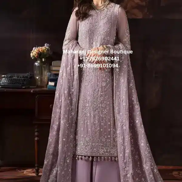 Royal Dusty Mauve Hand Embroidered Salwar Suit Set Elevate your ethnic wardrobe with the Royal Dusty Mauve Hand Embroidered Salwar Suit Set, a luxurious boutique creation designed for women who appreciate elegance, craftsmanship, and timeless fashion. Moreover, this premium outfit combines delicate hand embroidery, sophisticated tailoring, and graceful draping, making it an exceptional choice for weddings, festive celebrations, engagement ceremonies, receptions, Eid, Diwali, and family gatherings. The elegant dusty mauve colour offers a soft and luxurious appearance that complements every skin tone. Furthermore, the intricate embroidery throughout the kurta and dupatta showcases the beauty of traditional craftsmanship while embracing contemporary fashion trends. As a result, this designer salwar suit creates an effortlessly refined look for every special occasion. Whether you are attending a wedding in London, celebrating Diwali in Toronto, or dressing for a reception in New York, this outfit ensures you look graceful and feel comfortable throughout the day. Premium Hand Embroidery The beauty of this designer suit lies in its intricate handcrafted embroidery. Additionally, skilled artisans carefully create elegant floral motifs and detailed embellishments that add depth, texture, and sophistication to the overall design. In addition, the embroidery extends across the front panel, sleeves, borders, and dupatta, creating a cohesive and luxurious appearance. Therefore, every stitch reflects exceptional craftsmanship and boutique-quality finishing. Elegant Kurta Design The straight-cut kurta offers a flattering silhouette suitable for women of all ages. Moreover, the premium fabric drapes beautifully while allowing ease of movement. Key features include: Elegant round neckline Full-length embroidered sleeves Heavy floral embroidery Straight-cut silhouette Premium boutique finishing Comfortable fit Designer Palazzo Bottom The matching palazzo complements the embroidered kurta perfectly. Furthermore, its relaxed silhouette ensures comfort without compromising elegance. Features include: Wide-leg design Lightweight fabric Comfortable waistband Elegant finish Easy movement Embroidered Dupatta The coordinating embroidered dupatta completes the ensemble with effortless sophistication. Besides adding graceful movement, it enhances the overall luxury of the outfit and makes it ideal for bridal events and festive occasions. Perfect For This designer suit is ideal for: Wedding Functions Reception Parties Engagement Ceremonies Mehndi Sangeet Eid Celebrations Diwali Karwa Chauth Raksha Bandhan Anniversary Parties Family Gatherings Destination Weddings Festive Celebrations Cultural Events Formal Evening Parties Finally, this timeless outfit ensures you leave a lasting impression wherever you go. Why You'll Love This Outfit Premium hand embroidery Elegant dusty mauve colour Boutique-quality craftsmanship Comfortable all-day wear Luxurious festive look Perfect for weddings and celebrations Timeless ethnic elegance Worldwide shipping available Perfect for Customers in the UK, USA & Canada This luxury ethnic outfit is designed for women seeking premium Indian fashion abroad. Whether you're searching for designer salwar suits in the UK, party wear suits in the USA, or boutique ethnic wear in Canada, this elegant ensemble offers exceptional craftsmanship, timeless style, and premium quality. Care Instructions Dry clean only Store in a garment bag Steam iron on low heat Keep away from direct sunlight for prolonged periods Handle embroidered areas carefully Why Choose Maharani Designer Boutique? At Maharani Designer Boutique, every outfit is crafted with attention to detail, luxurious fabrics, and timeless artistry. Moreover, we specialize in premium ethnic wear for customers across the UK, USA, and Canada, offering elegant collections for weddings, festive occasions, and special celebrations. Our commitment to quality, craftsmanship, and customer satisfaction ensures that every purchase reflects sophistication and heritage. SEO Keywords Luxury Salwar Suit, Dusty Mauve Salwar Suit, Hand Embroidered Suit, Designer Salwar Suit, Party Wear Suit, Wedding Salwar Suit, Boutique Salwar Suit, Women's Ethnic Wear, Indian Suit UK, Indian Suit USA, Indian Suit Canada, Designer Pakistani Style Suit, Festive Salwar Suit, Embroidered Dupatta Set, Maharani Designer Boutique.