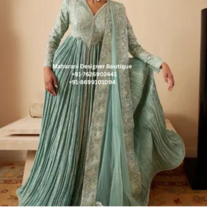 Royal Mint Green Embroidered Anarkali Suit Elevate your ethnic wardrobe with the Royal Mint Green Embroidered Anarkali Suit, an elegant occasion-wear ensemble designed for women who love graceful silhouettes, delicate embroidery, and sophisticated Indian fashion. This beautiful outfit features a soft mint green colour, a richly embroidered bodice, long sleeves, a flowing Anarkali silhouette, and a coordinating dupatta. Moreover, the finely detailed embroidery around the neckline, bodice, sleeves, and borders creates a refined and luxurious appearance. The pleated, floor-length Anarkali skirt adds beautiful movement to the outfit. Furthermore, the flowing silhouette creates an elegant look that works beautifully for weddings, receptions, festive celebrations, engagement parties, family functions, and special evening occasions. Whether you are shopping for Indian ethnic wear in the UK, USA, Canada, or India, this mint green Anarkali suit offers a sophisticated option for your next celebration. Elegant Mint Green Colour The soft mint green shade gives this outfit a fresh and sophisticated appearance. Unlike heavier traditional colours, mint green creates a lighter and more contemporary ethnic look. In addition, the subtle colour works beautifully with silver, pearl, diamond-look, and soft gold accessories. For a classic appearance, pair the outfit with delicate earrings and a statement bracelet. Alternatively, you can add heavier jewellery for a more glamorous wedding look. Therefore, the same Anarkali suit can be styled differently depending on the occasion. Intricate Embroidered Bodice The bodice features detailed embroidery that extends around the neckline and upper portion of the outfit. Moreover, the intricate detailing adds visual texture while maintaining the elegant character of the mint green base. The embroidered neckline creates a beautiful focal point and works particularly well with statement earrings. The sleeves also feature decorative detailing, helping create a coordinated appearance throughout the outfit. Embroidered Details Include: Detailed neckline Embellished bodice Long embroidered sleeves Decorative front detailing Refined border work Coordinating dupatta detailing As a result, the outfit has an elegant occasion-wear finish. Flowing Anarkali Silhouette The floor-length Anarkali silhouette is one of the most beautiful features of this ensemble. The skirt falls gracefully from the waist and expands toward the hem, creating a dramatic yet feminine appearance. Furthermore, the pleated construction creates beautiful movement when walking. This flowing silhouette is ideal for: Wedding receptions Engagement parties Sangeet Festive celebrations Family functions Dinner parties Evening events Special occasions Consequently, the outfit can become a versatile addition to an ethnic wardrobe. Matching Dupatta The coordinating mint green dupatta completes the ensemble. It adds an elegant layer to the outfit and can be styled in several ways. Traditional Draping Drape the dupatta over one shoulder and allow it to fall naturally along the side. Front Draping Pleat the dupatta neatly across the front for a polished formal appearance. Head Draping For a traditional wedding or festive look, drape the dupatta over the head. Moreover, the delicate detailing along the dupatta complements the embroidery on the Anarkali. Perfect Wedding Outfit This mint green Anarkali is an excellent choice for wedding celebrations. It can be styled for: Wedding receptions Engagement ceremonies Sangeet Mehndi Family weddings Bridal showers Wedding dinners Destination weddings Furthermore, the soft colour makes it particularly suitable for daytime weddings, garden celebrations, and elegant evening functions. Party Wear Anarkali Suit For women looking for an elegant party wear Anarkali suit, this design offers a sophisticated alternative to heavily embellished lehengas. The flowing silhouette creates a glamorous appearance without making the outfit feel overly heavy. In addition, the mint green colour makes it suitable for semi-formal and formal celebrations. Pair it with delicate jewellery for a sophisticated party look or add statement accessories for a more glamorous appearance. Engagement Outfit This outfit can also make a beautiful engagement look. For an engagement ceremony, style it with: Pearl earrings Statement necklace Embellished heels Soft curls Minimal clutch Light glam makeup As a result, you can create a graceful and sophisticated appearance without overwhelming the outfit. Festive Indian Wear The Royal Mint Green Anarkali is also suitable for festive occasions. Wear it for: Diwali Eid Vaisakhi Raksha Bandhan Karwa Chauth Lohri Navratri Family celebrations Cultural events Moreover, the elegant colour palette allows you to accessorise with both traditional and contemporary jewellery. Styling with Jewellery Mint green works beautifully with several jewellery styles. Pearl Jewellery Pearls create a soft and elegant appearance. Silver Jewellery Silver accessories enhance the cool undertones of mint green. Kundan Jewellery For a traditional wedding appearance, pair the outfit with a statement kundan set. Gold Jewellery Soft gold jewellery can add warmth and richness to the overall look. Therefore, you can easily customise the outfit according to your personal style. Hairstyle Ideas A sleek low bun is perfect for formal occasions. Decorate it with delicate flowers or traditional hair accessories for a wedding-inspired appearance. Alternatively, soft waves can create a modern and feminine look. Furthermore, an elegant updo helps showcase the embroidered neckline and statement earrings. Makeup Ideas The soft mint green shade pairs beautifully with natural and glamorous makeup. Consider: Glowing base Soft brown eyeshadow Defined eyeliner Peach blush Soft pink lipstick Nude lipstick Subtle highlighter For an evening event, you can add slightly more dramatic eye makeup and statement earrings. Meanwhile, daytime celebrations can be styled with softer makeup for a fresh appearance. Footwear Styling Complete your look with: Silver heels Nude heels Embellished sandals Metallic heels Traditional juttis Elegant flats In addition, choose comfortable footwear if you plan to wear the outfit for several hours. Mint Green Anarkali UK For customers searching for Anarkali suits in the UK, this mint green embroidered design is a beautiful choice for Indian weddings, cultural celebrations, and festive occasions. It can be styled for events in: London Birmingham Leicester Manchester Coventry Southall Moreover, its elegant silhouette makes it suitable for both traditional South Asian celebrations and multicultural events. Mint Green Anarkali USA For customers in the USA, this outfit is ideal for Indian weddings, receptions, engagement ceremonies, Diwali celebrations, and family events. It can be worn for celebrations in: New York New Jersey California Texas Chicago Washington Furthermore, the flowing silhouette can look particularly beautiful in event photography. Mint Green Anarkali Canada For women searching for Indian ethnic wear in Canada, this embroidered Anarkali offers a refined occasion-wear option. It can be styled for celebrations in: Toronto Brampton Mississauga Vancouver Calgary Edmonton Therefore, this versatile ensemble is suitable for both traditional and contemporary celebrations. Why Choose This Mint Green Anarkali? Elegant Colour Firstly, the soft mint green shade creates a sophisticated appearance. Detailed Embroidery Secondly, the intricate embroidery adds luxurious visual detail. Flowing Silhouette Thirdly, the floor-length Anarkali creates beautiful movement. Coordinating Dupatta Furthermore, the matching dupatta completes the traditional ensemble. Versatile Occasion Wear Finally, it can be styled for weddings, receptions, engagements, festivals, parties, and family celebrations. Product Features Product Type: Anarkali Suit Product Name: Royal Mint Green Embroidered Anarkali Suit Colour: Mint Green Style: Embroidered Indian Ethnic Wear Silhouette: Floor-Length Flared Anarkali Sleeves: Long Sleeves Dupatta: Matching Embroidered Dupatta Occasion: Wedding, Reception, Engagement, Party & Festive Wear Category: Luxury Indian Ethnic Wear Ideal Markets: UK, USA, Canada & India Care Instructions To maintain the beauty of the embroidery: Dry clean only. Store in a breathable garment bag. Keep embroidery away from rough surfaces. Avoid bleach and harsh detergents. Keep away from prolonged direct sunlight. Use gentle steaming when necessary. Store the dupatta carefully to protect its detailing. Avoid placing heavy objects over the embroidered areas. As a result, proper care can help maintain the outfit's elegant appearance for future celebrations. Mint Green Anarkali Suit, Mint Green Embroidered Anarkali, Designer Anarkali Suit, Anarkali Suit for Wedding, Party Wear Anarkali, Anarkali Suit with Dupatta, Embroidered Anarkali Suit, Indian Ethnic Wear, Wedding Anarkali Suit, Anarkali Suit UK, Anarkali Suit USA, Anarkali Suit Canada, Indian Wedding Outfit, Festive Anarkali Suit, Luxury Anarkali Suit, Engagement Anarkali, Party Wear Indian Suit, Maharani Designer Boutique. mint green embroidered Anarkali suit for women, mint green Anarkali suit for wedding, designer Anarkali suit UK, embroidered Anarkali suit USA, mint green ethnic wear Canada, luxury Anarkali suit with dupatta, floor length Anarkali suit for wedding, mint green party wear Anarkali, Indian wedding Anarkali suit UK, Indian ethnic outfit USA, Indian ethnic wear Canada, mint green wedding guest outfit, embroidered Anarkali for engagement, mint green festive outfit for women, designer Indian Anarkali suit, elegant Anarkali suit for reception, long Anarkali dress with dupatta, luxury Indian party wear, traditional Anarkali suit for women, Maharani Designer Boutique Anarkali.
