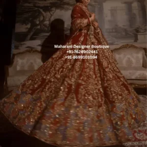 Royal Crimson Heritage Heavy Embroidered Bridal Lehenga Celebrate your special day in timeless elegance with the Royal Crimson Heritage Heavy Embroidered Bridal Lehenga, a luxurious Indian wedding ensemble created for women who love traditional bridal fashion with a grand, regal appearance. The rich deep red and crimson colour gives this lehenga a classic bridal character, while the extensive gold-toned embroidery creates an opulent and luxurious finish. Moreover, the dramatic full flare makes the outfit particularly striking when walking, dancing, or posing for wedding photographs. The ensemble features a beautifully embellished bridal blouse, a voluminous flared lehenga skirt, and a coordinating dupatta. Furthermore, intricate traditional-inspired motifs are distributed throughout the skirt, creating an elaborate pattern that enhances the overall richness of the outfit. Whether you are looking for a bridal lehenga for a wedding in the UK, USA, Canada, or India, this statement ensemble is designed to create a memorable traditional look. Regal Red Bridal Colour The deep red tone gives this outfit its unmistakable bridal appeal. Red has long been associated with celebration, romance, tradition, and wedding elegance in South Asian fashion. Therefore, a rich red lehenga remains a timeless choice for brides who want a classic wedding appearance. The darker red base also provides a beautiful contrast against the detailed gold embroidery. In addition, the colour can be styled beautifully with: Gold jewellery Kundan jewellery Polki sets Pearl accessories Gold bangles Bridal jhumkas Maang tikka Traditional bridal footwear Heavy Gold Embroidery The most distinctive feature of this bridal lehenga is its heavy all-over gold embroidery. The skirt showcases elaborate ornamental patterns arranged across multiple panels. Moreover, the extensive detailing creates depth and texture throughout the flowing silhouette. The embroidery becomes particularly striking toward the lower portion of the lehenga, where detailed borders provide a luxurious finishing effect. As a result, the outfit has a grand appearance that is ideal for a bride who wants her wedding outfit to make a strong visual statement. Dramatic Full-Flare Lehenga The generously flared skirt creates a beautiful, dramatic silhouette. Furthermore, the multiple embroidered panels give the lehenga exceptional movement when the bride walks or twirls. This makes it especially suitable for: Bridal entry Wedding photography Reception Sangeet Bridal portraits Dance performances Pre-wedding shoots Luxury wedding celebrations The wide flare can create beautiful movement in photographs, particularly during bridal portraits and cinematic wedding videos. Embellished Bridal Blouse The coordinating blouse is designed to complement the ornate skirt. The richly detailed bodice creates a balanced appearance with the expansive lehenga. Additionally, the traditional neckline and embellished detailing work beautifully with layered bridal jewellery. For a classic bridal appearance, style the blouse with a heavy necklace and matching earrings. Alternatively, a statement choker combined with long earrings can create a more contemporary bridal look. Coordinating Dupatta The bridal dupatta completes the ensemble and enhances its traditional character. It can be draped in several ways depending on your preferred bridal styling. Traditional Style Drape the dupatta over the head and allow it to fall gracefully over one shoulder. Contemporary Bridal Style Pleat the dupatta neatly over one shoulder while allowing the embroidered skirt and blouse to remain the focal point. Double Dupatta Look For a more elaborate bridal appearance, pair the main dupatta with a second lightweight bridal dupatta. Moreover, the rich red colour allows the dupatta to blend beautifully with traditional gold jewellery. Perfect Indian Bridal Lehenga The Royal Crimson Heritage Heavy Embroidered Bridal Lehenga is an ideal choice for brides who want a traditional and luxurious wedding appearance. It can be styled for: Wedding ceremony Bridal reception Sangeet Engagement Mehndi Destination wedding Bridal photoshoot Wedding reception Pre-wedding celebration Therefore, this outfit can become the centrepiece of a memorable bridal wardrobe. Red Wedding Lehenga for UK Brides For brides searching for a red bridal lehenga in the UK, this rich embroidered ensemble offers a classic Indian wedding look. It can be styled for South Asian weddings and multicultural celebrations in cities such as: London Birmingham Leicester Manchester Coventry Southall Furthermore, the dramatic embroidery and full flare can look particularly impressive in wedding photography and reception venues. Red Bridal Lehenga USA For Indian and South Asian brides in the USA, this luxury red lehenga can be styled for traditional wedding celebrations, receptions, Sangeet nights, and engagement functions. Popular wedding destinations include: New York New Jersey California Texas Chicago Washington Moreover, the rich red and gold colour combination works beautifully with traditional bridal jewellery. Red Bridal Lehenga Canada For customers searching for a red bridal lehenga in Canada, this design offers an elegant option for traditional and contemporary wedding celebrations. It can be worn for celebrations in: Toronto Brampton Mississauga Vancouver Calgary Edmonton In addition, the timeless red-and-gold combination makes it suitable for both traditional ceremonies and grand wedding receptions. Bridal Jewellery Styling Gold jewellery is an excellent match for this lehenga. Consider styling it with: Necklace A heavy kundan, polki, or traditional gold necklace can complement the embroidered blouse. Earrings Choose: Jhumkas Chandbalis Kundan earrings Polki earrings Head Jewellery For a traditional bridal appearance, add: Maang tikka Matha patti Passa Bangles Layer gold and red bangles for a classic bridal finish. Moreover, coordinated jewellery can bring the entire red-and-gold bridal look together. Bridal Makeup Ideas The rich crimson shade pairs beautifully with warm bridal makeup. Consider: Glowing complexion Defined eyes Warm brown eyeshadow Gold eyeshadow Winged eyeliner Soft blush Highlighter Red lipstick Deep rose lipstick However, the makeup can be adjusted according to your personal style and wedding event. For a daytime ceremony, a softer makeup look can create an elegant appearance. Meanwhile, for an evening reception, a deeper lip and more dramatic eye makeup can complement the richness of the lehenga. Hairstyle Ideas A traditional low bridal bun is a beautiful choice for this ensemble. Decorate the hairstyle with: Fresh flowers Gajra Gold hair accessories Traditional bridal jewellery Alternatively, soft waves or a polished updo can create a modern bridal appearance. Furthermore, an updo allows the blouse neckline and bridal jewellery to remain visible. Footwear Styling Complete the outfit with comfortable yet elegant footwear. Recommended choices include: Gold heels Embellished bridal sandals Traditional juttis Gold wedges Metallic heels Bridal flats Therefore, you can choose footwear according to comfort, venue, and wedding duration. Wedding Reception Styling This lehenga can create a particularly dramatic reception look. For an evening reception, pair it with: Heavy statement necklace Kundan earrings Gold clutch Embellished heels Glamorous makeup Elegant updo Moreover, the gold embroidery can catch the light beautifully during evening celebrations. Sangeet Styling The full flare makes this outfit suitable for Sangeet celebrations and dance performances. Furthermore, the flowing skirt can create beautiful movement during photographs and performances. For a Sangeet look, consider lighter jewellery and comfortable footwear while keeping the dramatic lehenga as the centrepiece. Engagement Styling For an engagement celebration, this red lehenga can be styled with slightly lighter accessories. For example, choose statement earrings, a delicate necklace, and soft waves. As a result, you can achieve an elegant appearance without making the look as elaborate as a wedding-day bridal style. Why Choose This Bridal Lehenga? Rich Red Colour Firstly, the deep red shade creates a timeless bridal appearance. Elaborate Gold Embroidery Secondly, the extensive embroidery provides a luxurious and traditional finish. Dramatic Flare Thirdly, the full-flare skirt creates beautiful movement. Traditional Appeal Furthermore, the overall styling reflects classic Indian bridal fashion. International Styling Finally, the design can be styled beautifully for weddings in India, the UK, USA, Canada, and other destinations. Product Features Product Type: Bridal Lehenga Choli Product Name: Royal Crimson Heritage Heavy Embroidered Bridal Lehenga Colour: Deep Red / Crimson Embroidery: Heavy Gold-Toned Embroidery Silhouette: Full-Flare Lehenga Style: Traditional Luxury Indian Bridal Wear Occasion: Wedding, Reception, Sangeet, Engagement & Festive Events Ideal For: Brides and special-occasion wear Target Markets: UK, USA, Canada & India Care Instructions To preserve the embroidery and colour of this bridal outfit: Dry clean only. Store the lehenga in a breathable garment bag. Keep the embroidery away from rough surfaces. Avoid bleach and harsh detergents. Do not expose the outfit to direct sunlight for long periods. Use gentle steaming when necessary. Fold or hang carefully to protect embellished areas. Store jewellery separately from the fabric. Avoid placing heavy objects on the embroidered skirt. As a result, careful storage can help maintain the beauty of the bridal outfit for future occasions. Red bridal lehenga, red bridal lehenga choli, red wedding lehenga, heavy embroidered bridal lehenga, gold embroidered lehenga, red and gold bridal lehenga, luxury bridal lehenga, designer bridal lehenga, Indian wedding lehenga, bridal lehenga UK, bridal lehenga USA, bridal lehenga Canada, wedding lehenga for bride, traditional bridal lehenga, heavy work lehenga, wedding reception lehenga, Sangeet lehenga, engagement lehenga, Indian bridal outfit, Maharani Designer Boutique. red heavy embroidered bridal lehenga choli, red and gold bridal lehenga for wedding, luxury red bridal lehenga UK, red bridal lehenga USA, red bridal lehenga Canada, heavy gold work bridal lehenga, traditional red wedding lehenga for bride, designer red lehenga choli for wedding, Indian bridal lehenga UK, Indian bridal lehenga USA, Indian bridal lehenga Canada, red wedding outfit for bride, full flare bridal lehenga with heavy embroidery, red and gold wedding outfit, luxury Indian wedding outfit for women, traditional bridal lehenga with gold embroidery, red lehenga for wedding reception, red lehenga for Sangeet, bridal lehenga for destination wedding, Maharani Designer Boutique bridal lehenga.