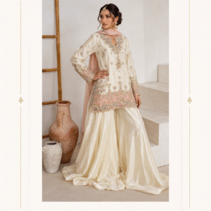 Maharani Ivory Blush Embroidered Sharara Suit Step into effortless elegance with the Maharani Ivory Blush Embroidered Sharara Suit, Ivory & Blush Pink Embroidered Sharara Suit, Maharani designer boutique jalandhar, featuring a graceful ivory and soft blush pink colour combination. The ensemble showcases delicate floral embroidery and intricate embellishment, creating a refined festive look. Perfect for weddings, festive celebrations, engagement ceremonies, mehndi functions, family occasions and elegant evening gatherings, this designer sharara suit combines traditional craftsmanship with contemporary sophistication. Brand: Maharani Designer Boutique Category: Sharara Suit Colour: Ivory & Blush Pink Work: Floral Embroidery & Embellishment Occasion: Wedding, Festive, Engagement & Party Wear Maharani Ivory Floral Heritage Lehenga,Maharani Blush Pink Royal Embroidered Salwar Suit,Maharani Blush Pink Royal Embroidered Lehenga,Blush Pink Bridal Lehenga Choli,Blush Garden Embroidery Sharara Suit