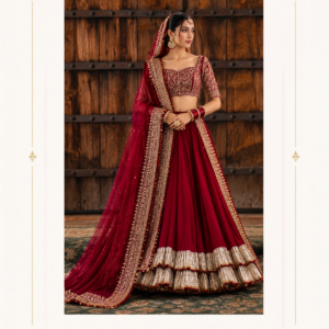 Maharani Blush Royal Embroidered Bridal Lehenga Make your wedding celebrations unforgettable with the Maharani Crimson Maroon Royal Embroidered Bridal Lehenga, Crimson Maroon Bridal Lehenga with Gold Embroidery & Ruffled Border , Maharani Designer Boutique Jalandhar, a timeless creation inspired by traditional Indian bridal elegance. Featuring a rich crimson-maroon colour, intricate golden embroidery, and luxurious detailing, this designer lehenga is perfect for brides who love a regal and sophisticated look. Discover luxury bridal fashion at Maharani Designer Boutique, where timeless Indian traditions meet contemporary elegance. Explore designer bridal lehengas online with worldwide shipping options. Product Highlights Colour: Crimson Maroon Style: Designer Bridal Lehenga Work: Intricate golden embroidery Blouse: Embellished blouse with traditional detailing Lehenga: Flowing skirt with a layered metallic ruffle border Dupatta: Matching maroon dupatta with an ornate embroidered border Occasions: Weddings, receptions, engagements, and bridal celebrations Brand: Maharani Designer Boutique