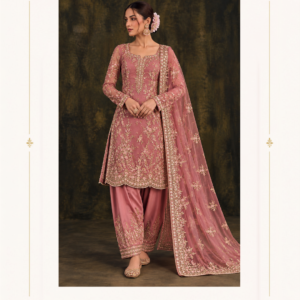 Maharani Dusty Mauve Royal Embroidered Salwar Suit Elevate your ethnic wardrobe with the Maharani Dusty Mauve Royal Embroidered Salwar Suit, Dusty Mauve Designer Punjabi Salwar Suit with Intricate Gold Embroidery , Maharani Designer Boutique Jalandhar, a graceful creation that blends traditional Indian craftsmanship with timeless sophistication. Designed in a beautiful dusty mauve pink shade, this designer Punjabi salwar suit features intricate gold-toned embroidery across the straight-cut kurta, full sleeves, and neckline. Delicate floral motifs and ornate borders enhance its elegant appearance, while the matching salwar pants feature beautifully embroidered hems for a coordinated finish. Product Highlights Colour: Dusty Mauve Pink Style: Designer Punjabi Salwar Suit Work: Intricate gold-toned floral embroidery Kurta: Embroidered neckline, full sleeves, and decorative hem Bottom: Matching salwar pants with embroidered borders Dupatta: Sheer mauve dupatta with embroidered motifs and an ornate border Occasions: Weddings, festive celebrations, parties, and family functions Royal Dusty Mauve Hand Embroidered Salwar Suit,Dusty Mauve Designer Embroidered Saree with Heavy Border,Maharani Mauve Bloom Designer Saree,Dusty Rose Embroidered Anarkali Lehenga,Maharani Rose Gold Embroidered Salwar Suit