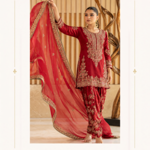 Maharani Scarlet Royale Golden Embroidered Punjabi Suit Add a touch of royal elegance to your ethnic wardrobe with the Maharani Scarlet Royale Golden Embroidered Punjabi Suit, Red Designer Punjabi Salwar Suit with Heavy Golden Embroidery & Floral Bottom, Maharani Designer Boutique Jalandhar, from Maharani Designer Boutique. Designed for women who appreciate traditional craftsmanship and luxurious fashion, this stunning red ensemble is perfect for festive celebrations and special occasions. Explore premium designer Punjabi suits online at Maharani Designer Boutique, with worldwide shipping available for customers in India and abroad. Product Details Colour: Scarlet Red Category: Designer Punjabi Salwar Suit Work: Golden floral embroidery Neckline: Embellished slit neckline Sleeves: Three-quarter sleeves with detailed embroidery Bottom: Red floral printed trousers with embroidered accents Dupatta: Matching red dupatta with decorative border Style: Traditional, festive, and elegant Occasion: Weddings, festivals, parties, and family functions Brand: Maharani Designer Boutique' Sage Green Embroidered Designer Sui, Emerald Green Bridal Lehenga Choli, Olive Royale Embroidered Salwar Suit, MDB 21447, MDB 23138